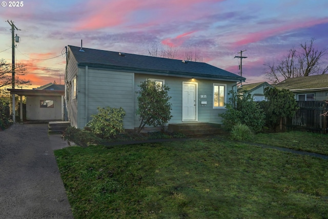 view of front of house with a lawn