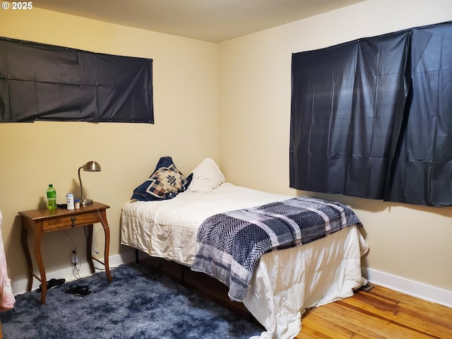 2640 Court Ave, Baker City, OR 97814 - bedroom featuring baseboards and wood finished floors