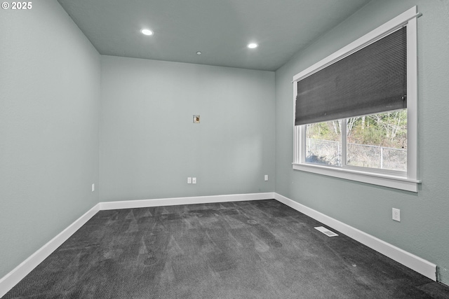 view of carpeted spare room