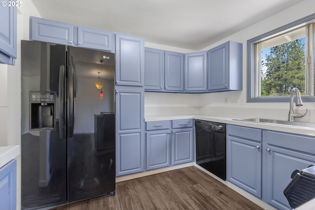 505/515 Empress Ave, Eugene, OR 97405 - kitchen featuring refrigerator with ice dispenser, black dishwasher, dark wood-style floors, light countertops, and blue cabinets