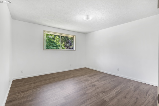505/515 Empress Ave, Eugene, OR 97405 - spare room featuring wood finished floors and a textured ceiling