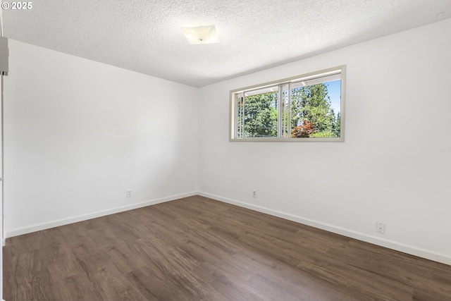 505/515 Empress Ave, Eugene, OR 97405 - unfurnished room with wood finished floors and a textured ceiling