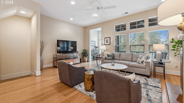 living area featuring recessed lighting, a ceiling fan, visible vents, and light wood finished floors