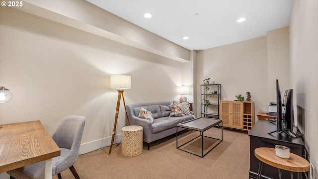 living area featuring recessed lighting, baseboards, and carpet floors