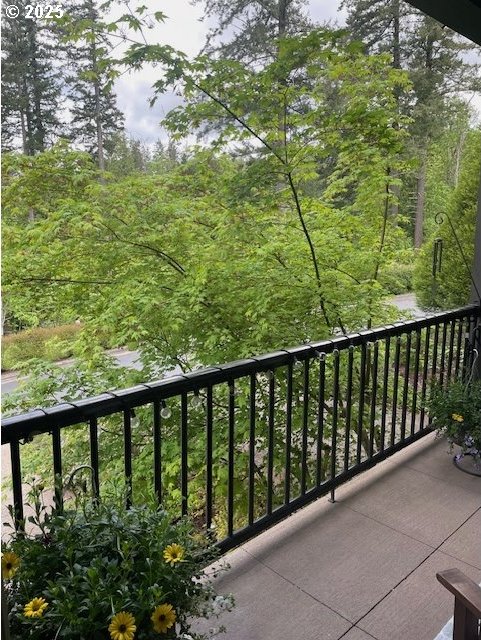 balcony with a wooded view