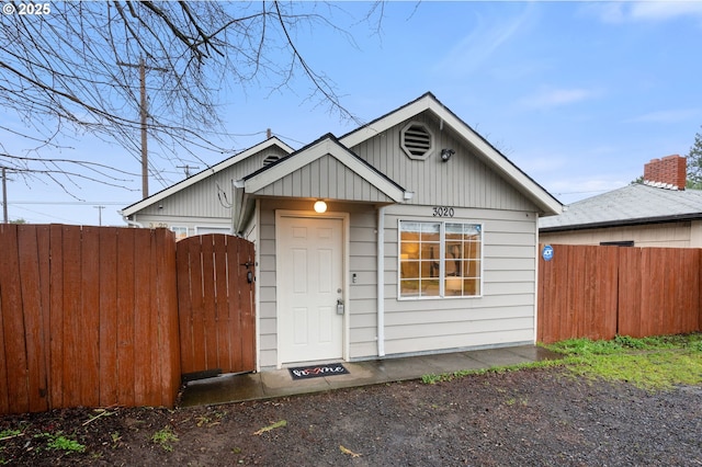 exterior space featuring a gate and fence