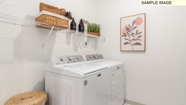 laundry room featuring laundry area and washing machine and dryer