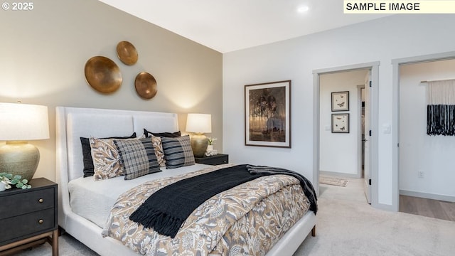 bedroom with carpet and baseboards