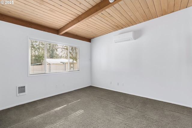 carpeted spare room with beam ceiling, wood ceiling, a wall mounted AC, and baseboards