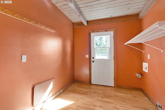 entryway with baseboards, beam ceiling, wood ceiling, and light wood finished floors