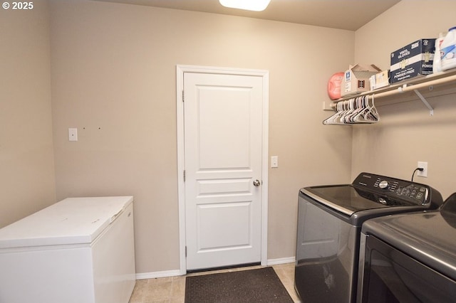 87743 Rendezvous Loop, Veneta, OR 97487 - washroom featuring washer and clothes dryer, baseboards, and light tile patterned floors