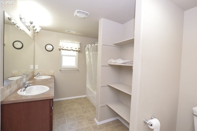 bathroom featuring toilet, baseboards, double vanity, and shower / tub combo with curtain