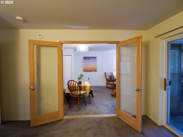 interior space featuring carpet flooring and french doors