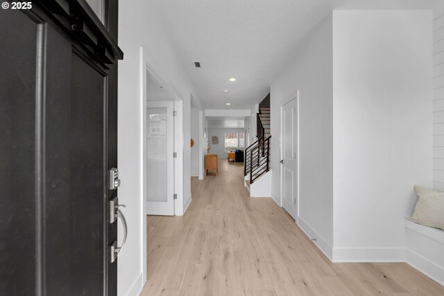 2928 S Harper Valley Way, Ridgefield, WA 98642 - entrance foyer featuring visible vents, recessed lighting, stairs, light wood finished floors, and baseboards