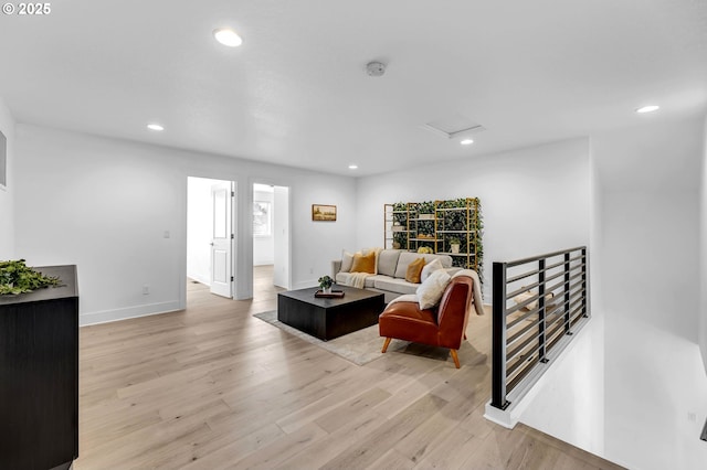 2928 S Harper Valley Way, Ridgefield, WA 98642 - living area with light wood-type flooring, attic access, baseboards, and recessed lighting