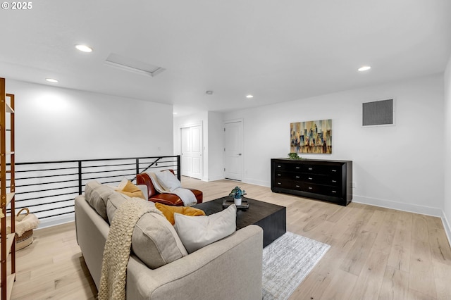 2928 S Harper Valley Way, Ridgefield, WA 98642 - living area with wood finished floors, attic access, baseboards, and recessed lighting