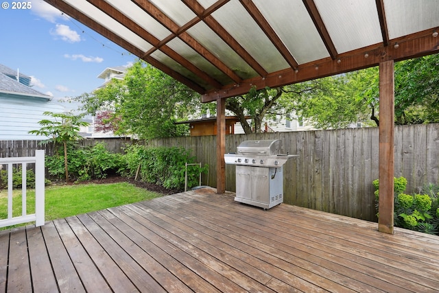 wooden deck featuring grilling area