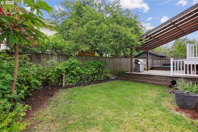 view of yard with a wooden deck
