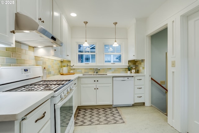 kitchen featuring light countertops, exhaust hood, white appliances, white cabinetry, and a sink