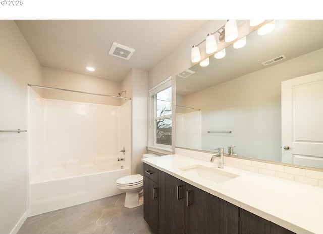 full bathroom with vanity, bathtub / shower combination, and toilet