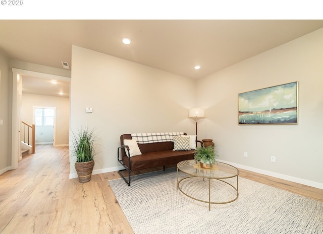 living area featuring light hardwood / wood-style flooring