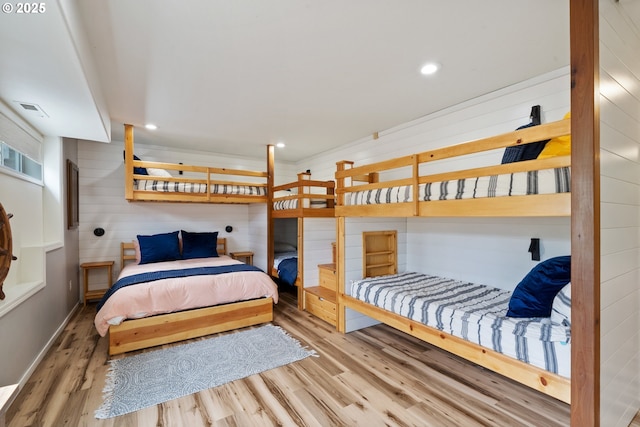 4330 Mcminnville Ave, Neskowin, OR 97149 - bedroom with wood finished floors, wooden walls, and recessed lighting