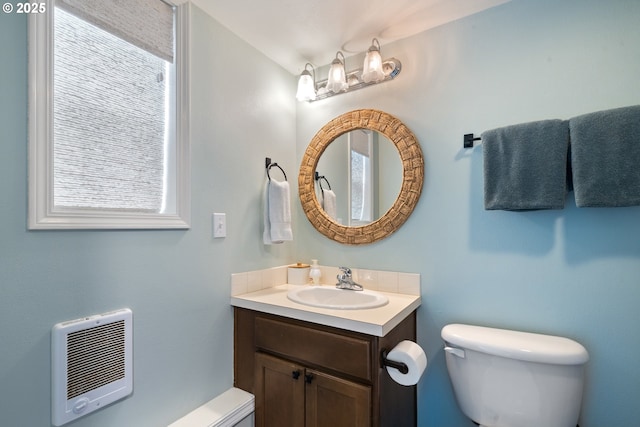 4330 Mcminnville Ave, Neskowin, OR 97149 - bathroom featuring vanity, heating unit, and healthy amount of natural light