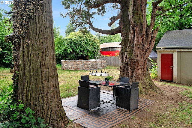 3911 E 16th Ave, Eugene, OR 97403 - view of patio with outdoor dining space and a storage shed