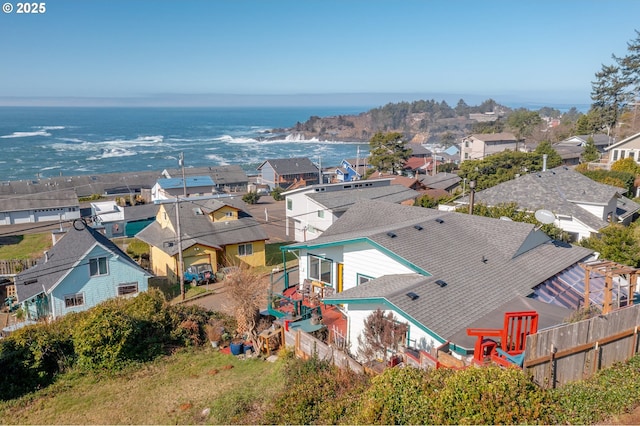 bird's eye view featuring a water view and a residential view