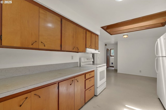 78650 Rat Creek Rd, Cottage Grove, OR 97424 - kitchen featuring white appliances, under cabinet range hood, light countertops, concrete flooring, and brown cabinetry