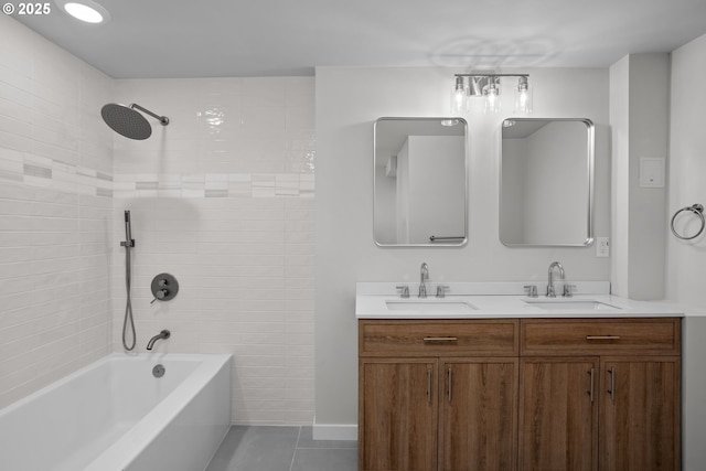 full bathroom featuring a sink, double vanity, shower / bathing tub combination, and tile patterned flooring