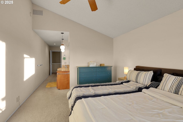 bedroom with ceiling fan, visible vents, light carpet, and high vaulted ceiling