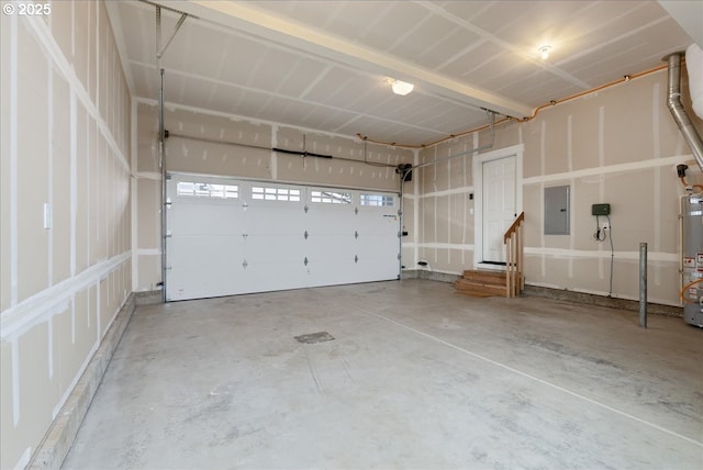 garage with water heater and electric panel