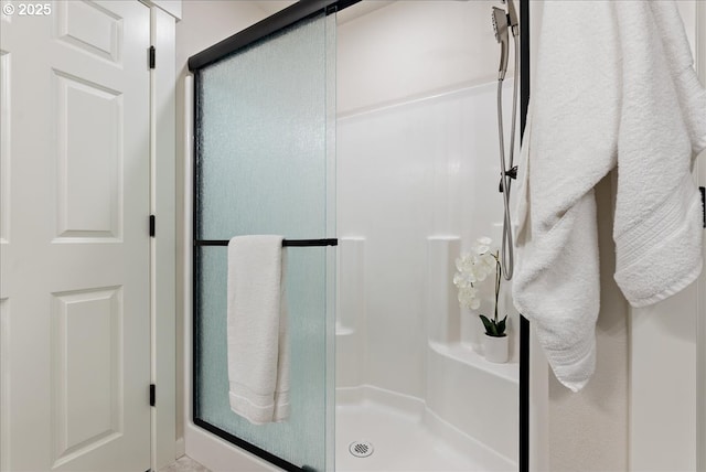 bathroom with a stall shower