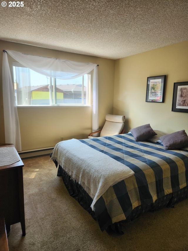 950 Evergreen Rd Unit 109, Woodburn, OR 97071 - carpeted bedroom featuring a baseboard heating unit and a textured ceiling