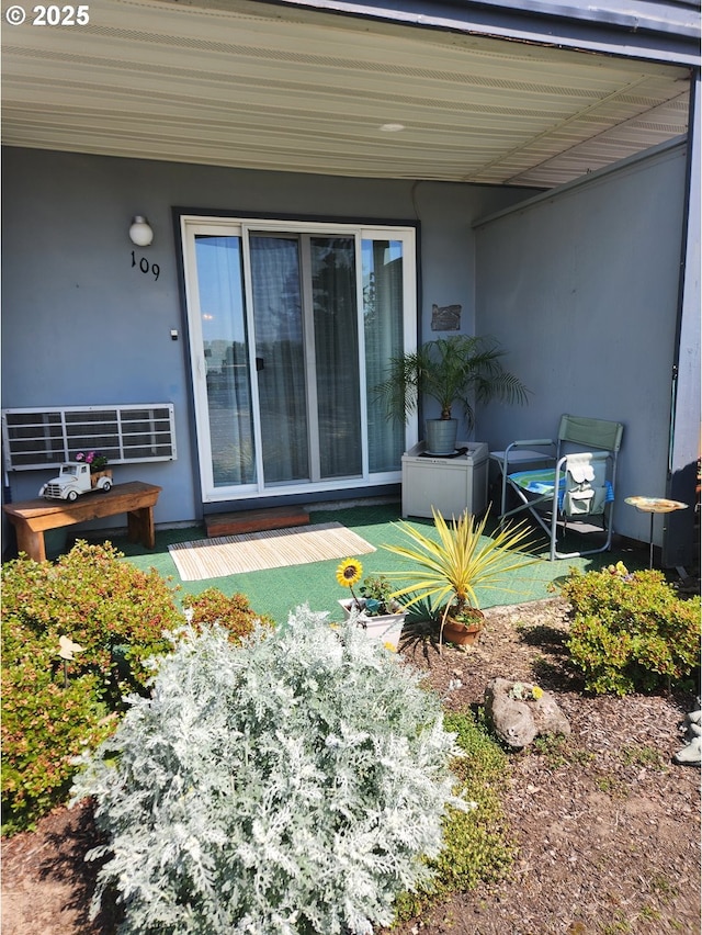 950 Evergreen Rd Unit 109, Woodburn, OR 97071 - property entrance featuring stucco siding and a deck