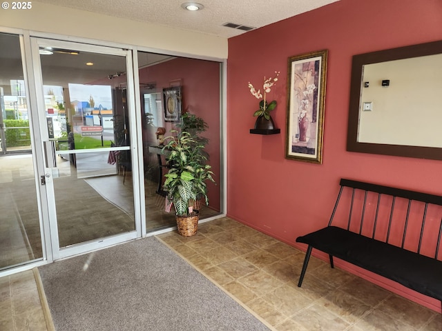 950 Evergreen Rd Unit 109, Woodburn, OR 97071 - doorway with a textured ceiling