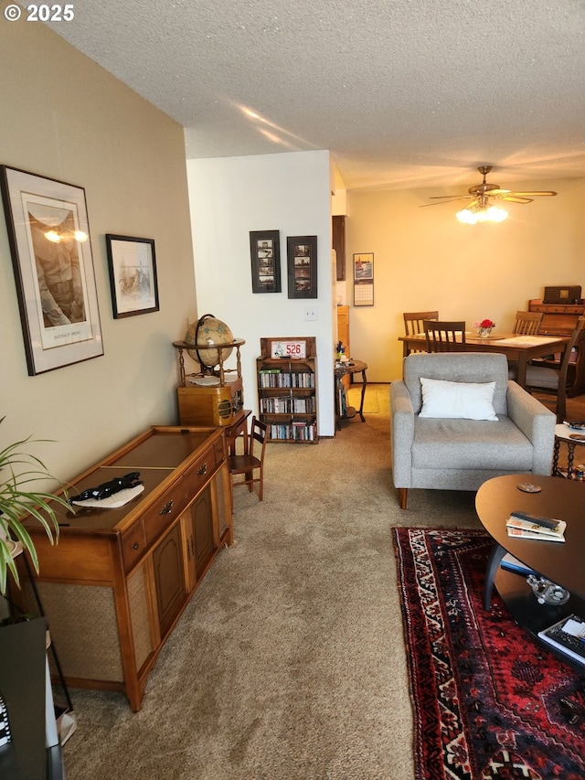 950 Evergreen Rd Unit 109, Woodburn, OR 97071 - living area featuring light carpet, a ceiling fan, and a textured ceiling