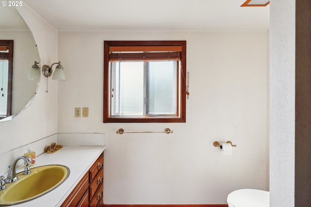 6901 SE Oaks Park Way Unit 1, Portland, OR 97202 - half bathroom featuring toilet and vanity