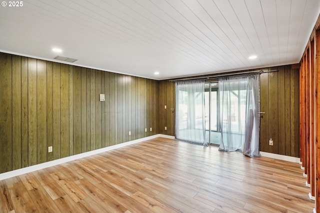 6901 SE Oaks Park Way Unit 1, Portland, OR 97202 - unfurnished room featuring wood walls and wood finished floors