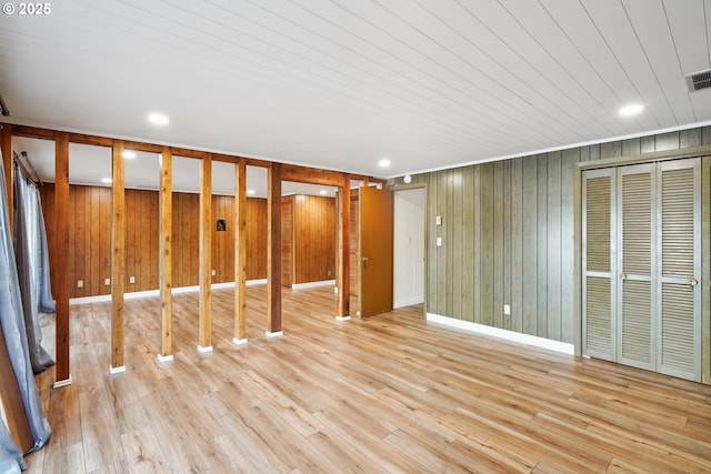 6901 SE Oaks Park Way Unit 1, Portland, OR 97202 - basement featuring wood finished floors, wooden walls, baseboards, and recessed lighting
