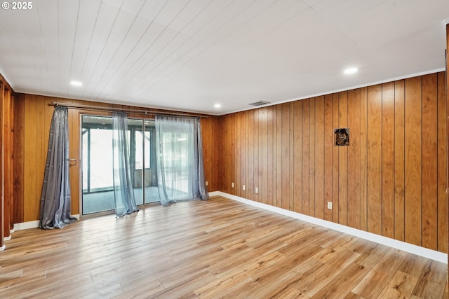 6901 SE Oaks Park Way Unit 1, Portland, OR 97202 - unfurnished room featuring wood finished floors, wood walls, recessed lighting, and baseboards