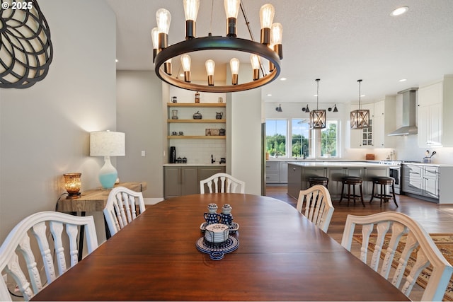 19428 NE 259th St, Battle Ground, WA 98604 - dining space featuring a chandelier, recessed lighting, and dark wood-style floors