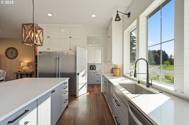 19428 NE 259th St, Battle Ground, WA 98604 - kitchen featuring a sink, plenty of natural light, gray cabinets, recessed lighting, and light stone counters