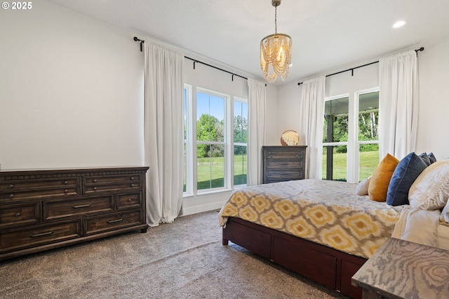 19428 NE 259th St, Battle Ground, WA 98604 - carpeted bedroom featuring a chandelier and recessed lighting