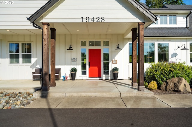 19428 NE 259th St, Battle Ground, WA 98604 - property entrance with board and batten siding and a shingled roof