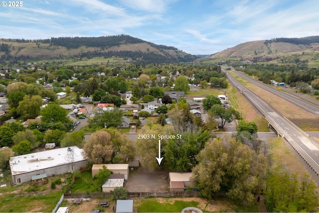 2903 N Spruce St, La Grande, OR 97850 - drone / aerial view of a mountainous background and a main thoroughfare