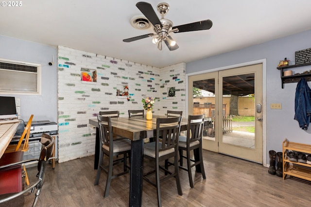 2903 N Spruce St, La Grande, OR 97850 - dining room featuring a ceiling fan, dark wood-style floors, and brick wall