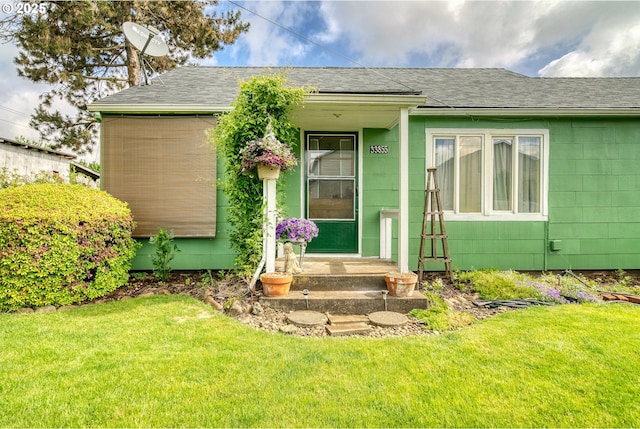33855 NE Blossom Dr, Scappoose, OR 97056 - property entrance featuring a yard and a shingled roof