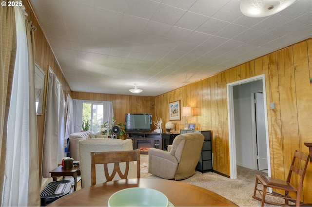 33855 NE Blossom Dr, Scappoose, OR 97056 - dining space with carpet floors and wooden walls